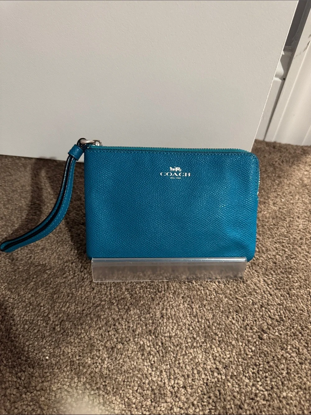 COACH Teal Pebbled Leather Wristlet wallet